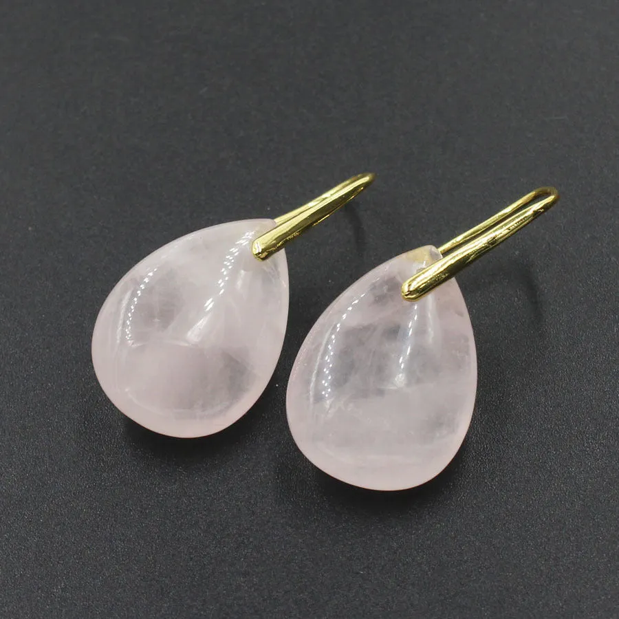 A pair of geometric water drop shaped earrings made from crystal in an electroplated finish.