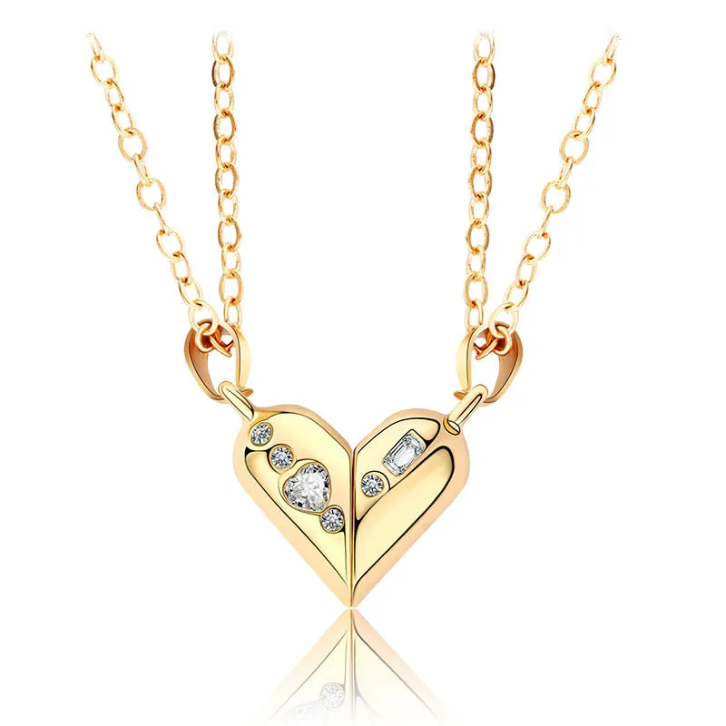 Love couple necklace pair with rotating magnet stone heart pendant in alloy and electroplating finish