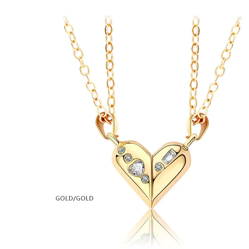 Love couple necklace pair with rotating magnet stone heart pendant in alloy and electroplating finish