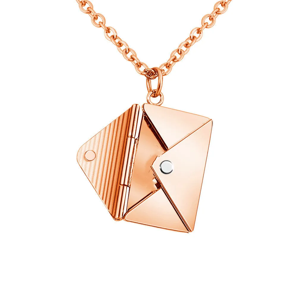 Titanium steel envelope pendant necklace with chain on a woman's neck, gold finish
