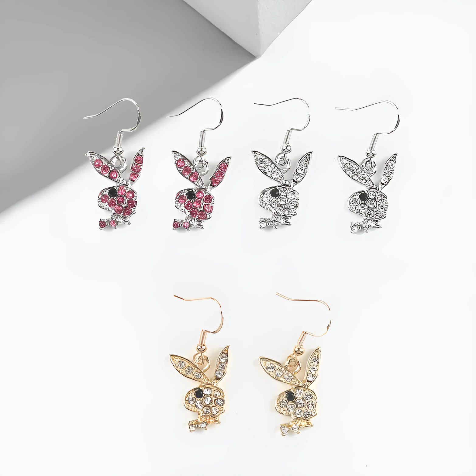 Cute full diamond rabbit stud earrings in silver, pink, or gold colour options.