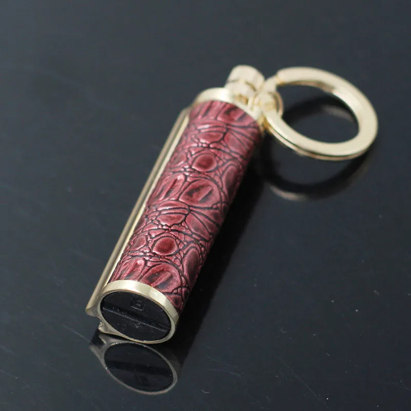 Metal keychain lighter with flint striker and bottle opener in black nickel finish