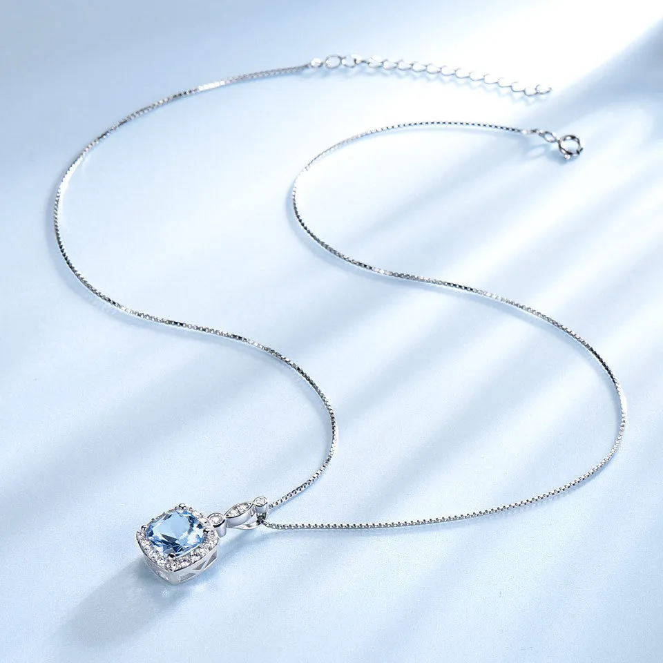 925 sterling silver jewellery set with sky blue topaz stones, including necklace, bracelet and earrings