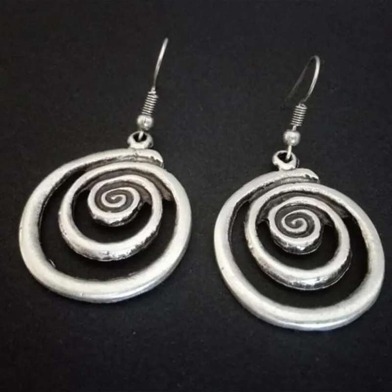 Silver geometric spiral distressed earrings with retro design measuring 2.6 by 5 centimetres