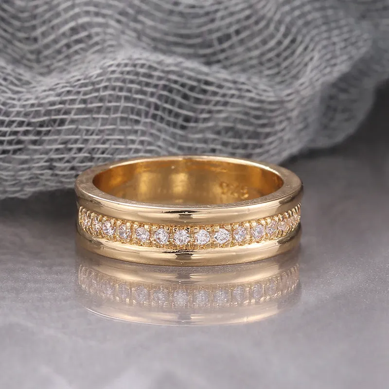 Gold plated geometric rhinestone ring with inlaid stone on white background, size options