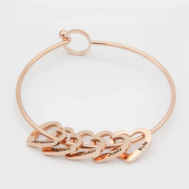 Love bracelet with peach heart charm and name lettering in stainless steel, silver colour