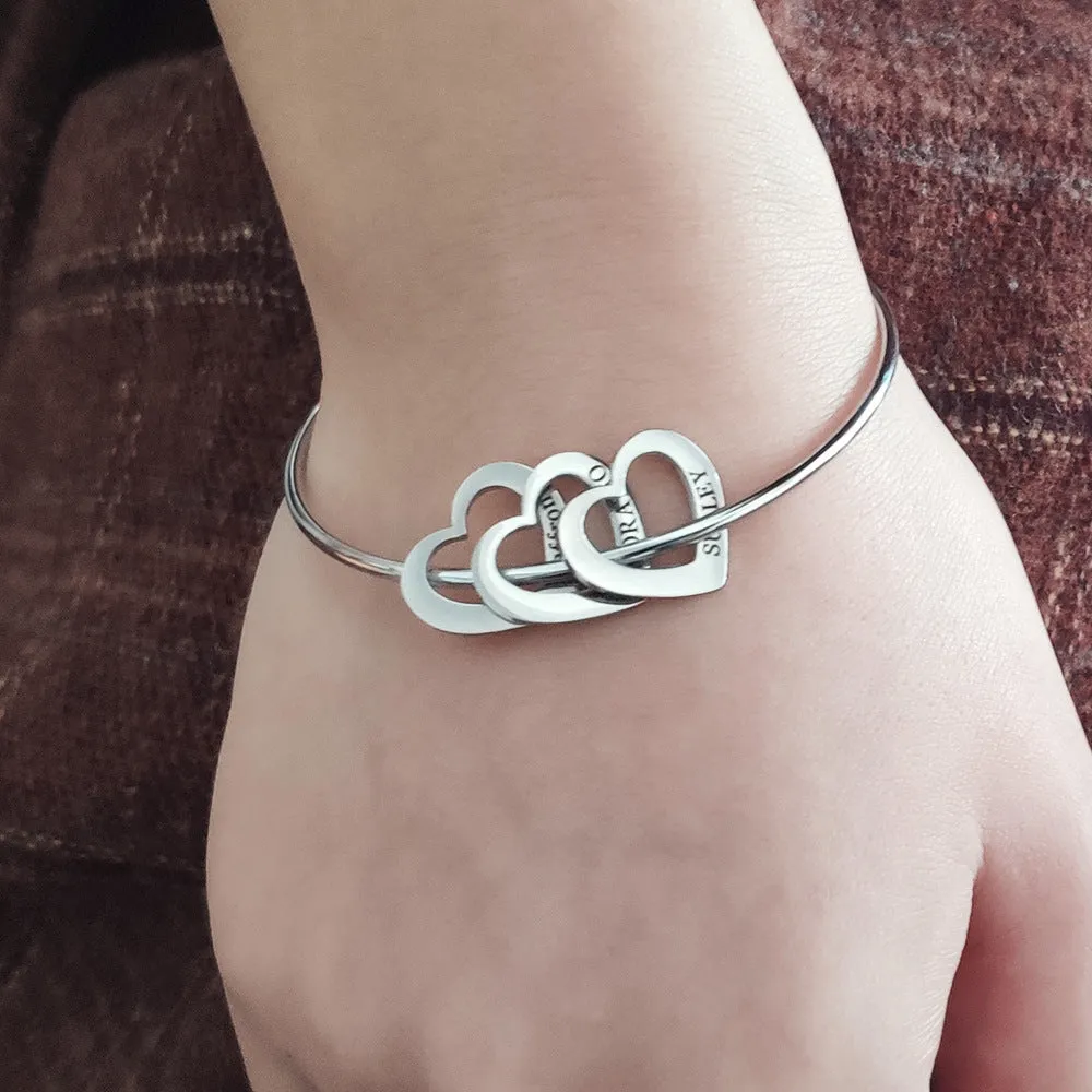 Love bracelet with peach heart charm and name lettering in stainless steel, silver colour
