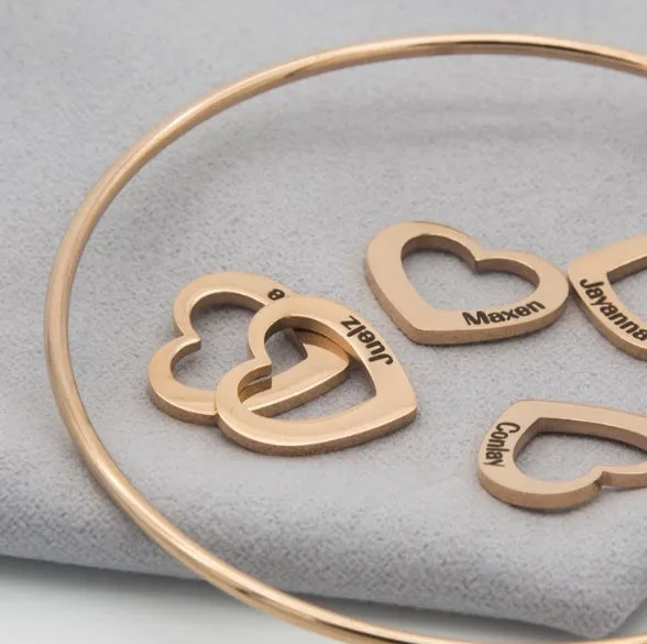 Love bracelet with peach heart charm and name lettering in stainless steel, silver colour