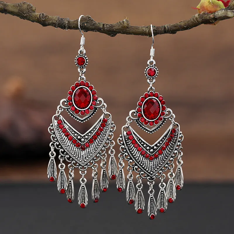 Retro long drop earrings with purple crystal fringes on an alloy setting.