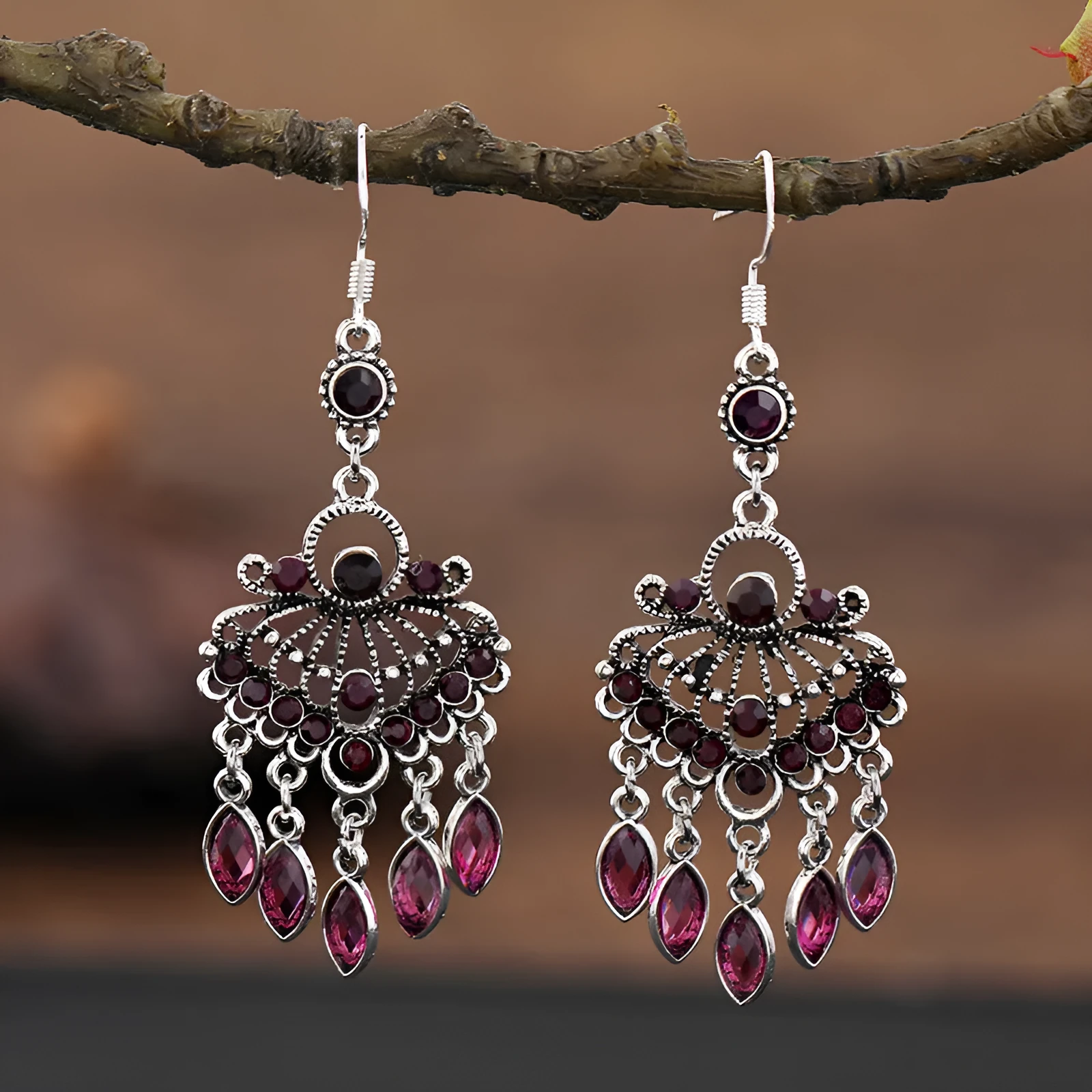 Retro long drop earrings with purple crystal fringes on an alloy setting.