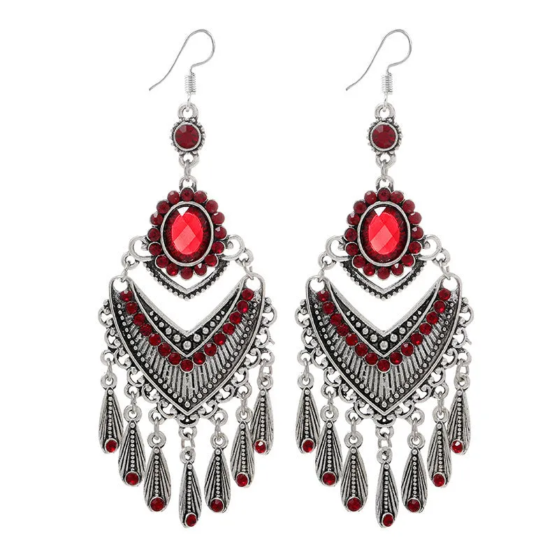 Retro long drop earrings with purple crystal fringes on an alloy setting.