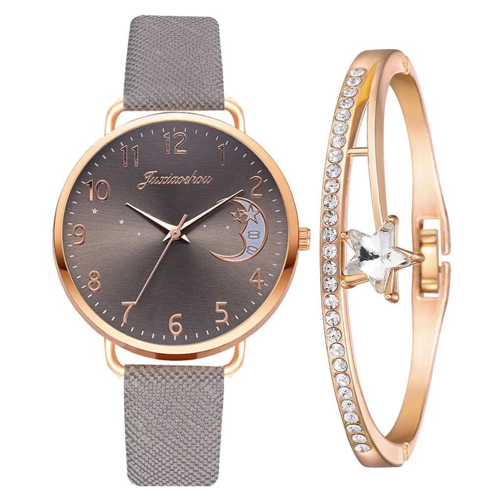 Ladies quartz watch with moon pattern dial and textile strap in round alloy case