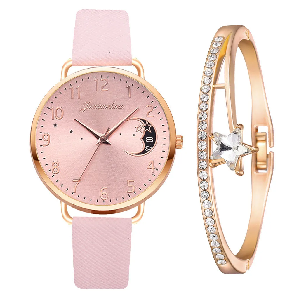 Ladies quartz watch with moon pattern dial and textile strap in round alloy case