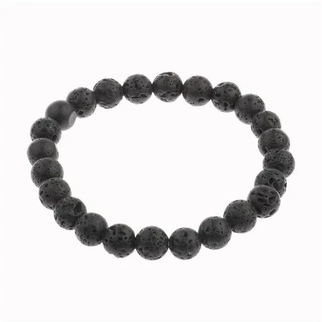 Purple Arrow volcanic stone bracelet on a neutral background showing bead texture and elastic cord