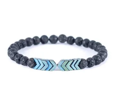 Purple Arrow volcanic stone bracelet on a neutral background showing bead texture and elastic cord