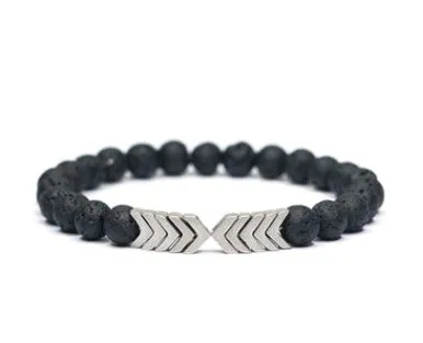 Purple Arrow volcanic stone bracelet on a neutral background showing bead texture and elastic cord