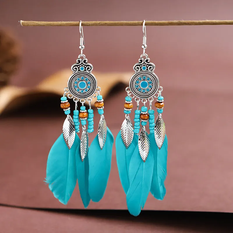 Handmade feather pattern bohemian earrings in multiple colours with leaf design detail