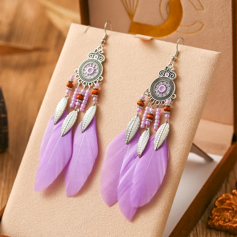 Handmade feather pattern bohemian earrings in multiple colours with leaf design detail