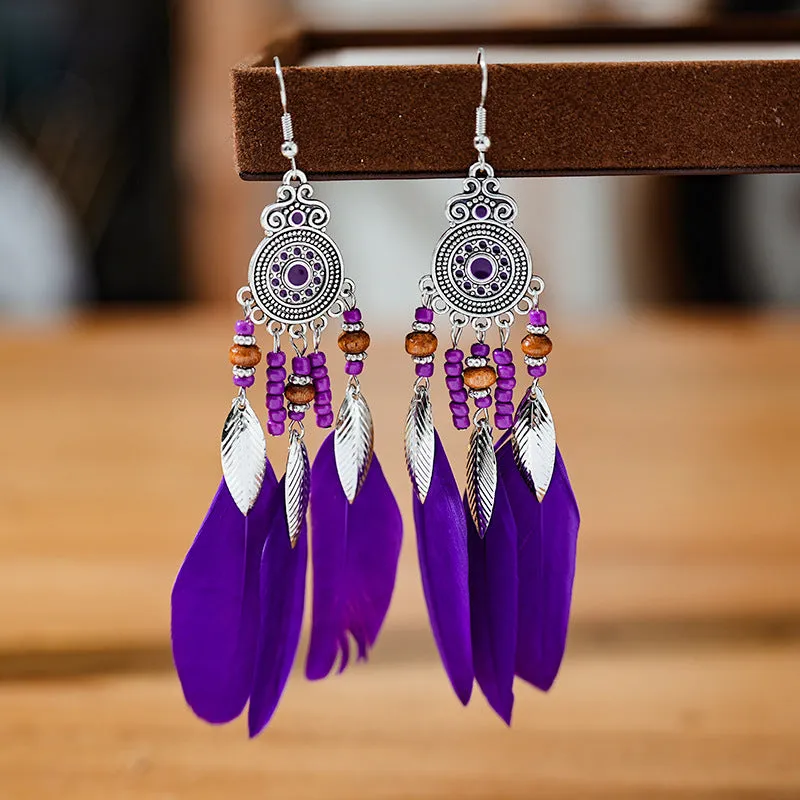 Handmade feather pattern bohemian earrings in multiple colours with leaf design detail