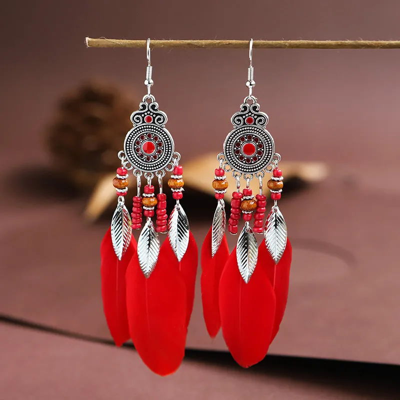 Handmade feather pattern bohemian earrings in multiple colours with leaf design detail