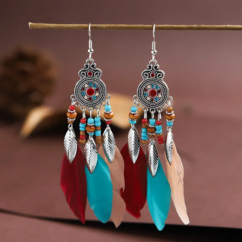Handmade feather pattern bohemian earrings in multiple colours with leaf design detail