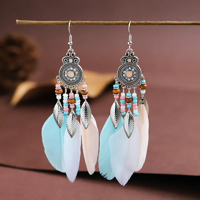 Handmade feather pattern bohemian earrings in multiple colours with leaf design detail