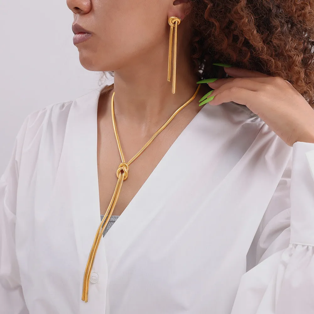 Gold knotted tassel snake chain long necklace with matching titanium steel electroplated earrings