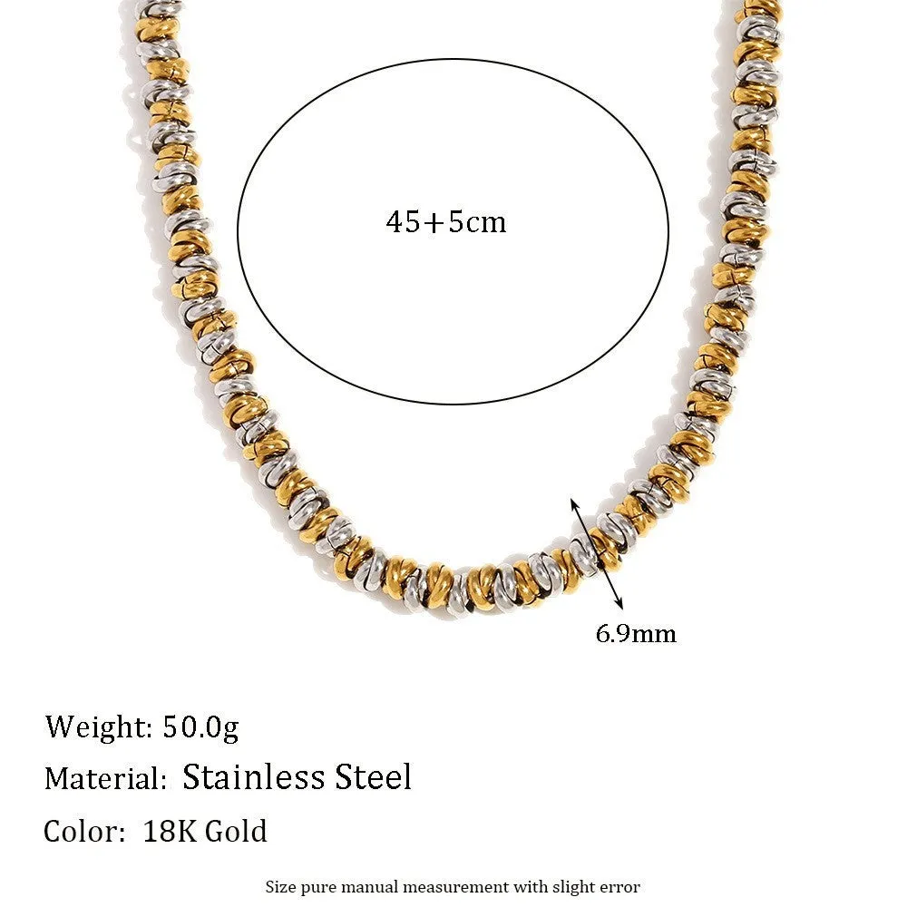 Gold electroplated geometric jewellery set for women with earrings, necklace, and bracelet.