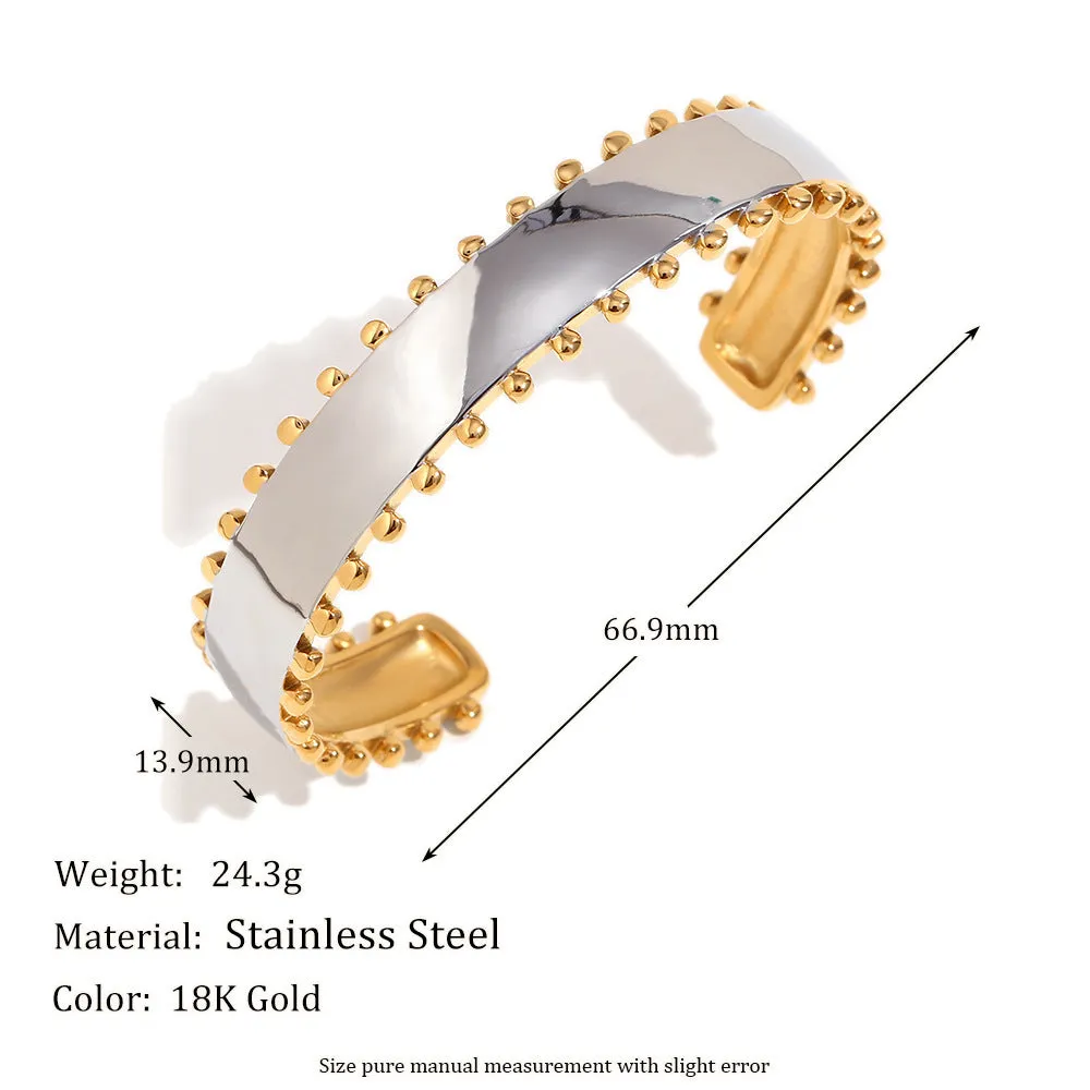 Gold electroplated geometric jewellery set for women with earrings, necklace, and bracelet.