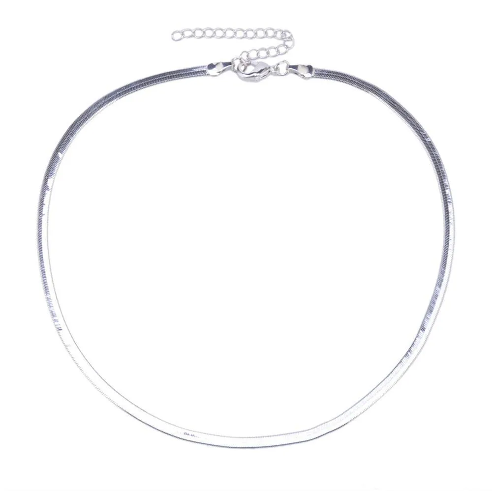 Star Goddess gold duo layering choker necklace on display