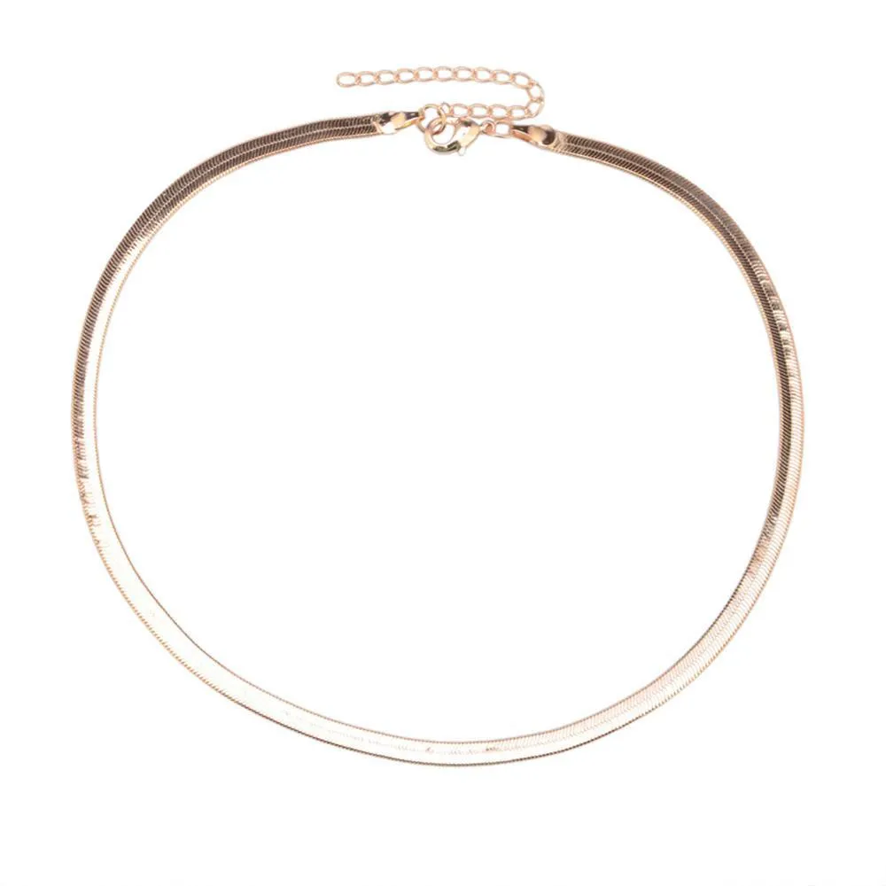 Star Goddess gold duo layering choker necklace on display