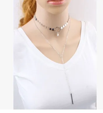 Star Goddess gold duo layering choker necklace on display