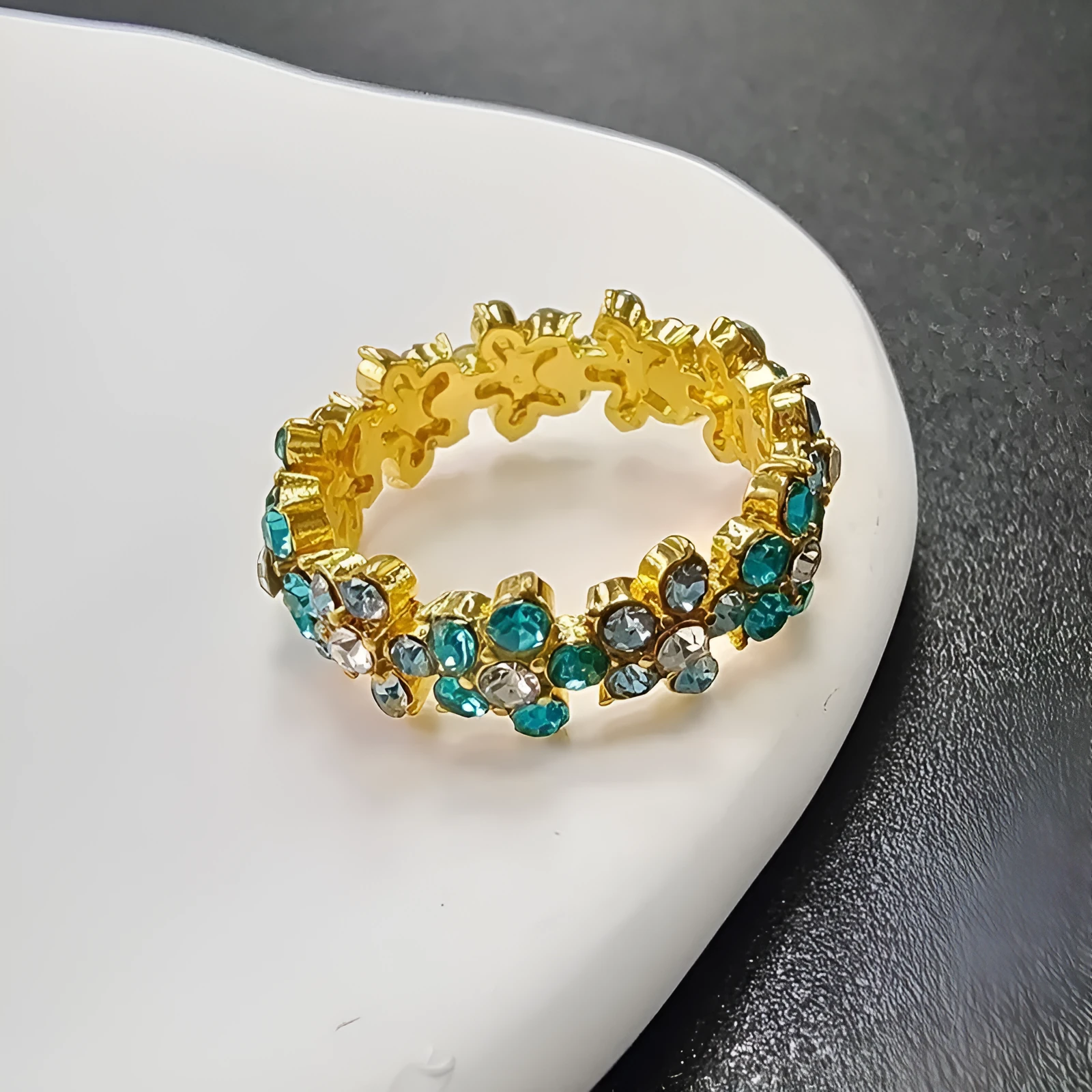 Creative full diamond elephant design fashion ring in electroplated alloy on a hand.