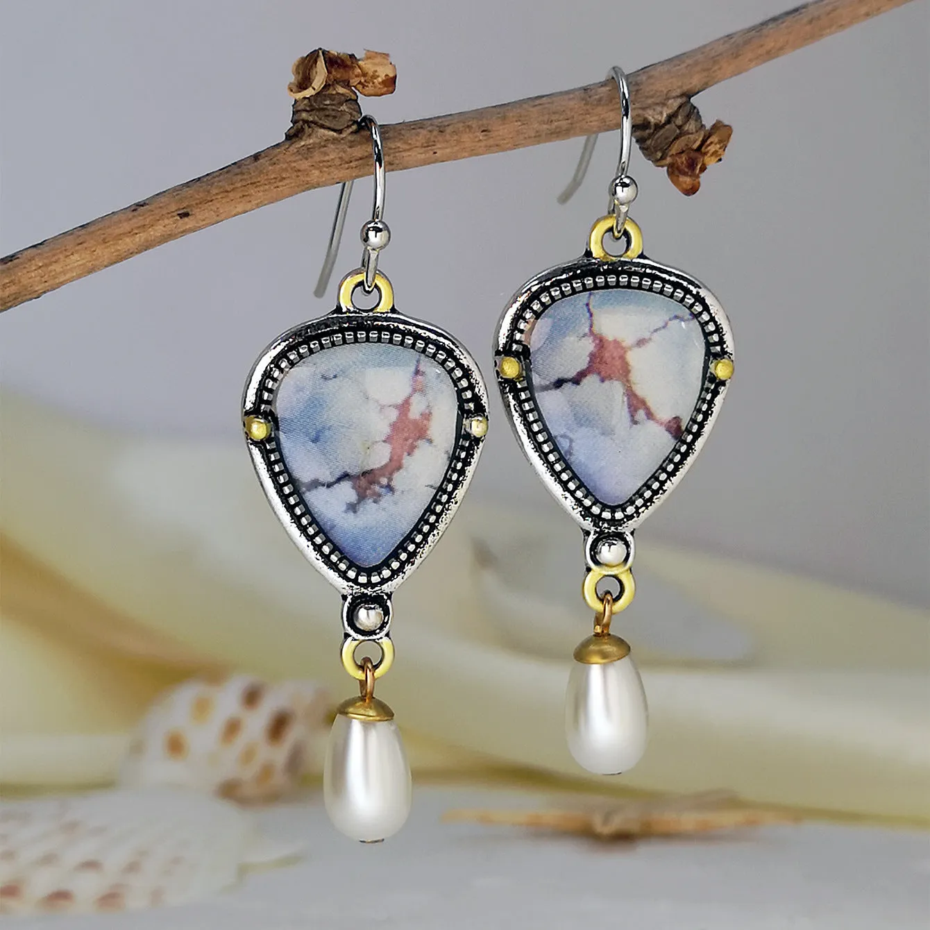 Retro blue geometric drop earrings with synthetic opal and pearl accents on electroplated metal