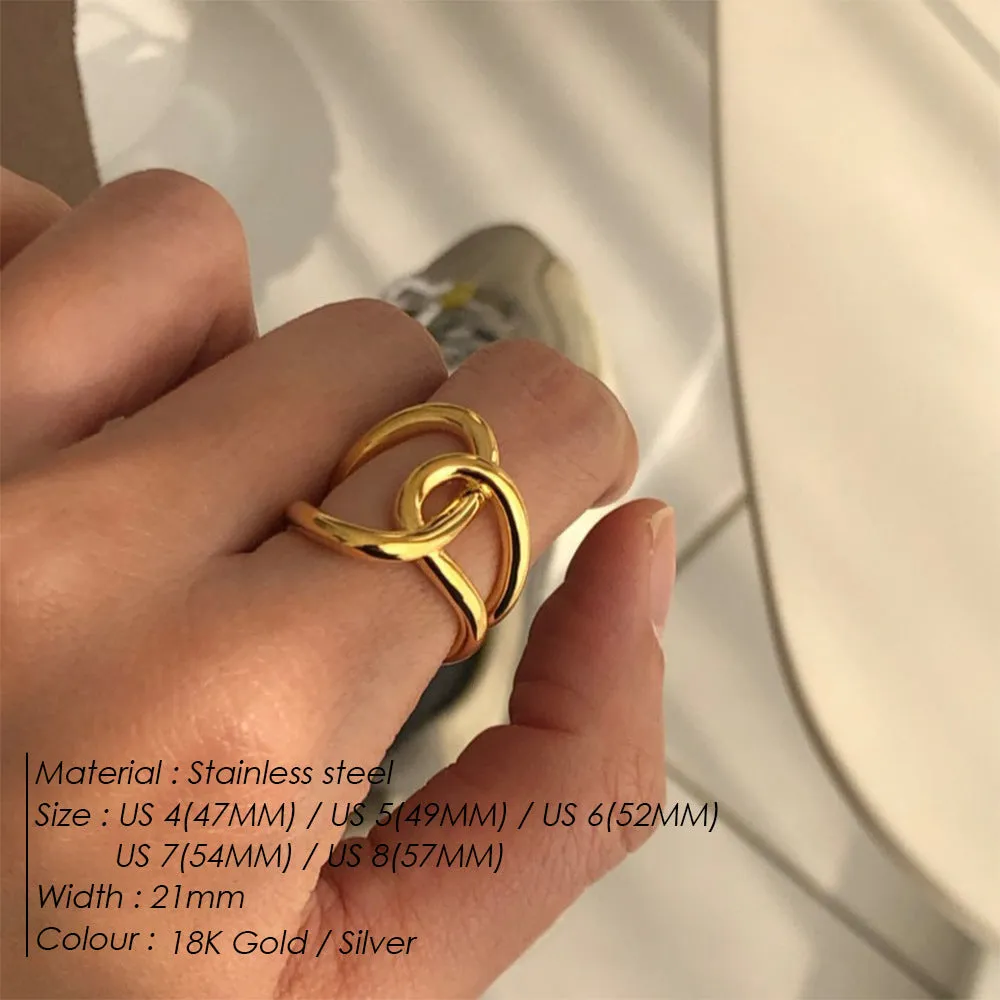 Women's stainless steel adjustable knot ring in geometric U-shape, shown in gold and steel colour finishes.