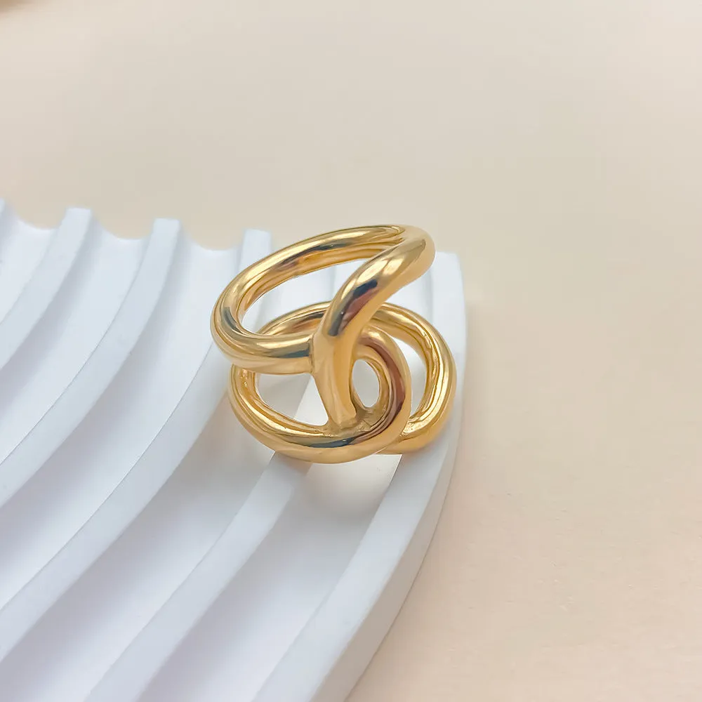 Women's stainless steel adjustable knot ring in geometric U-shape, shown in gold and steel colour finishes.