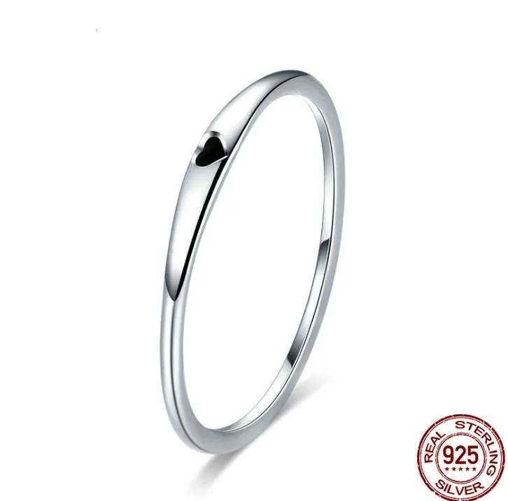 925 sterling silver round circle ring with heart engrave and enamel finish on white background