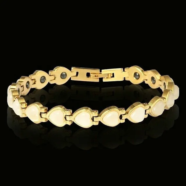 Silver tone metal bracelet on a flat surface, unisex design for men women children