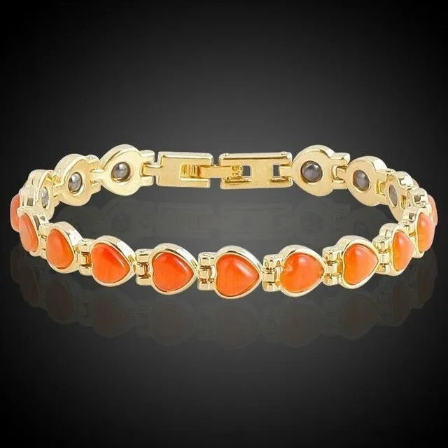 Silver tone metal bracelet on a flat surface, unisex design for men women children