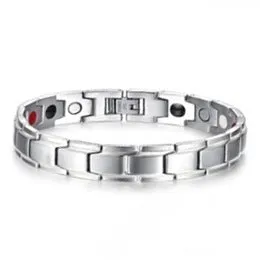 Silver tone metal bracelet on a flat surface, unisex design for men women children