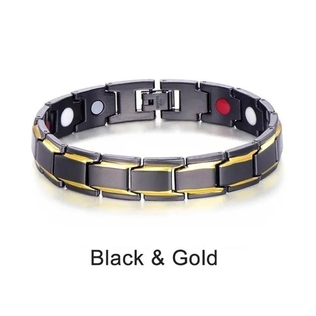 Silver tone metal bracelet on a flat surface, unisex design for men women children