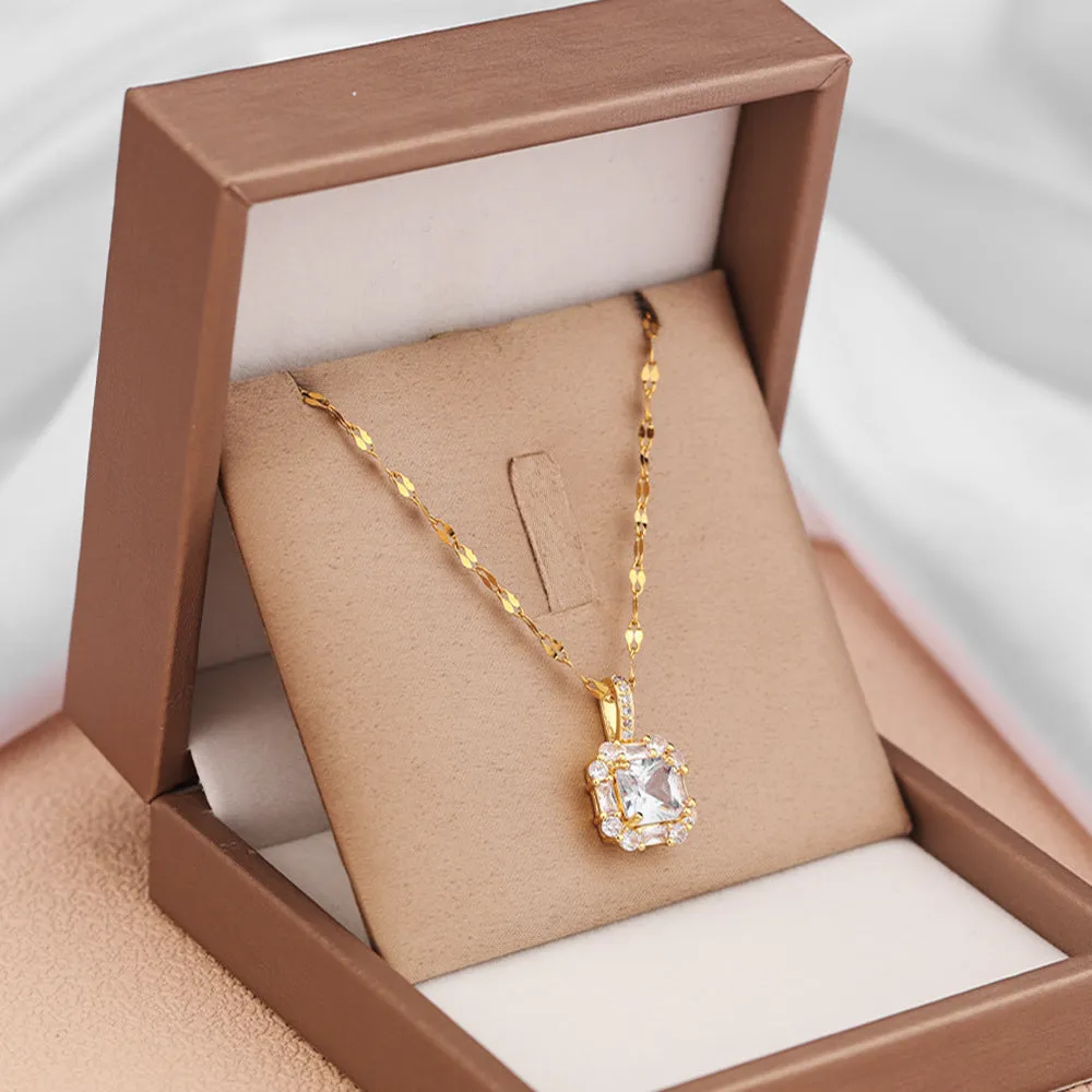 Women's gold geometric clavicle chain with quadrilateral pendant and gemstone inlay on water wave chain