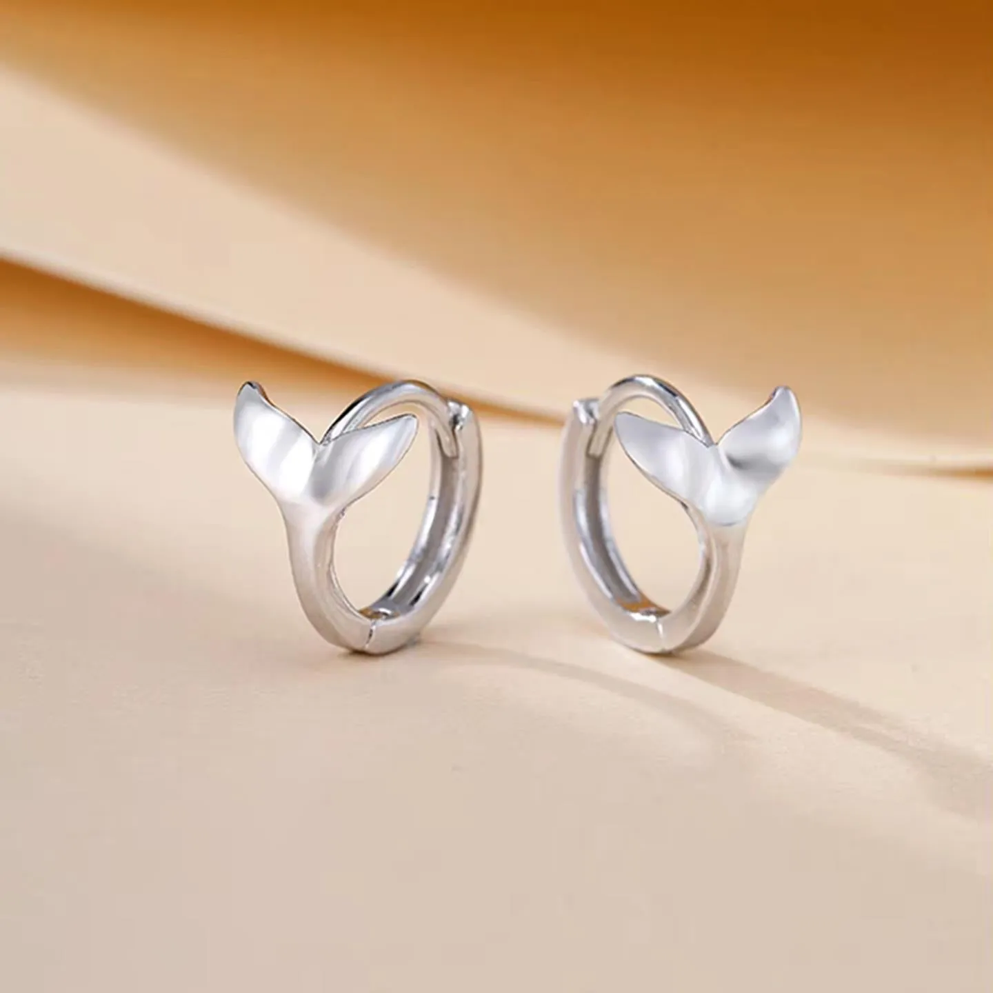 Women's fishtail design copper earrings in white gold or yellow gold electroplated finish