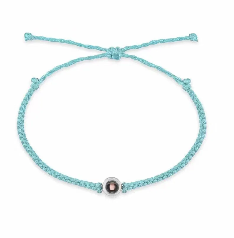 Personalised photo projection bracelet in copper with gold rope, showing unisex geometric shape