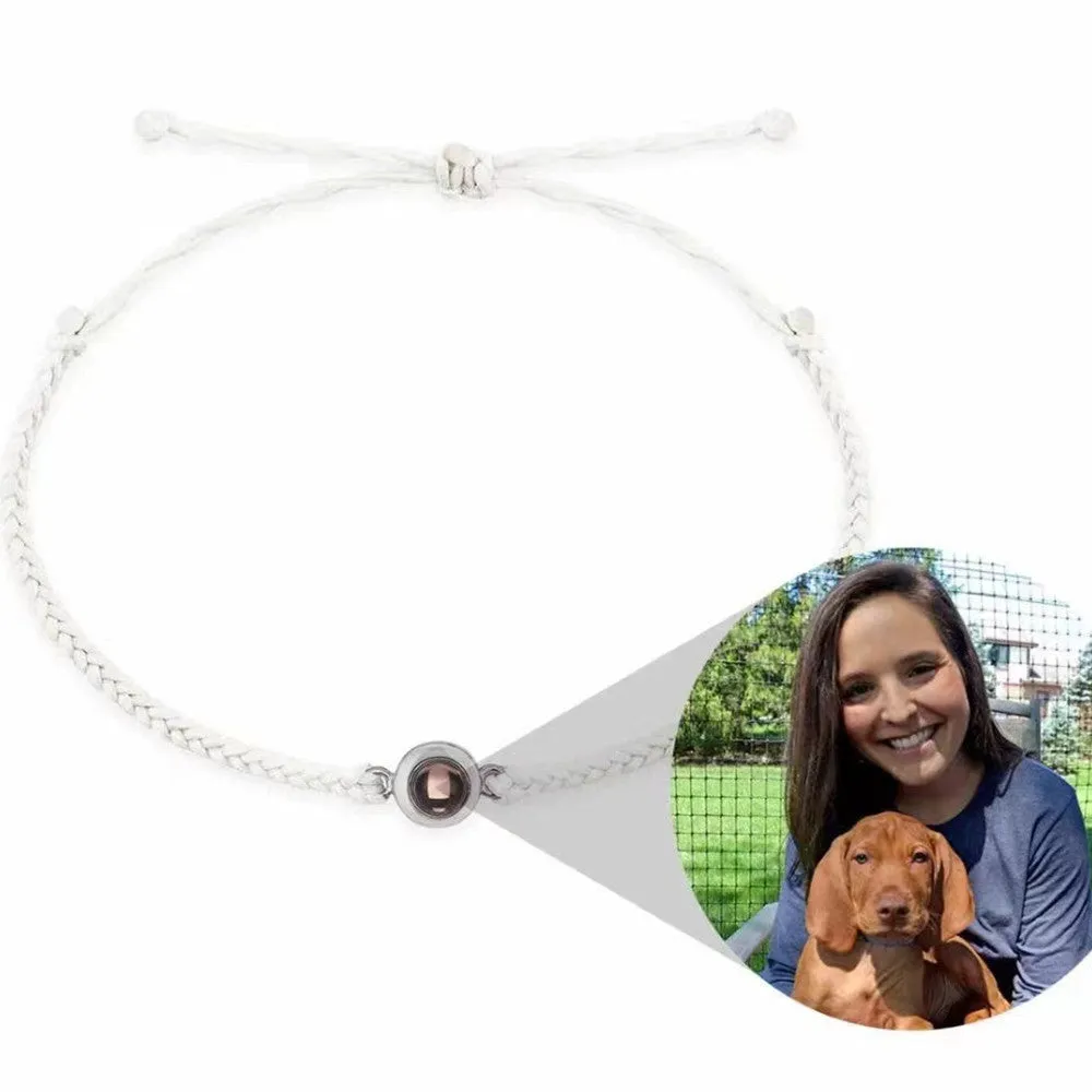Personalised photo projection bracelet in copper with gold rope, showing unisex geometric shape