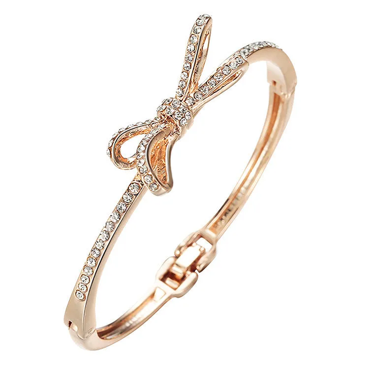 Rose gold electroplated copper women's bracelet with bow and diamond accents