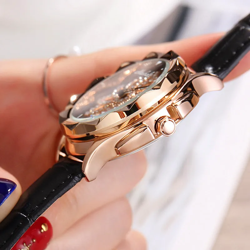 Ladies quartz watch with rotating dial, 40mm alloy case, PU leather strap, and pin buckle closure