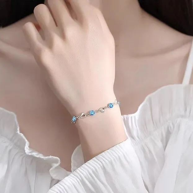 Blue beating heart necklace and bracelet set with mixed gem inlay on electroplated copper