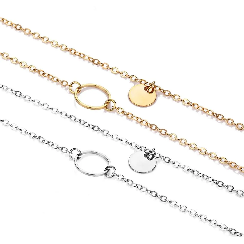 Gold multi-layer sequined choker necklace with drop pendant on woman's neck
