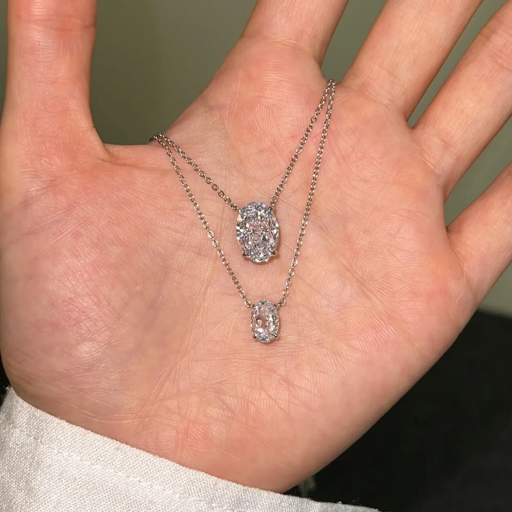 Sterling silver necklace with geometric oval ice flower pendant in platinum or gold finish
